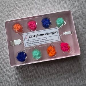 NWT LED phone charger with multicolored Pom-poms